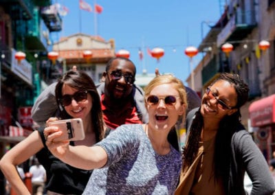 Taking a group selfie on a food tour