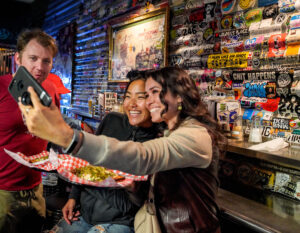 Taking a selfie with pizza on a North Beach Food Tours with Stretchy Pants