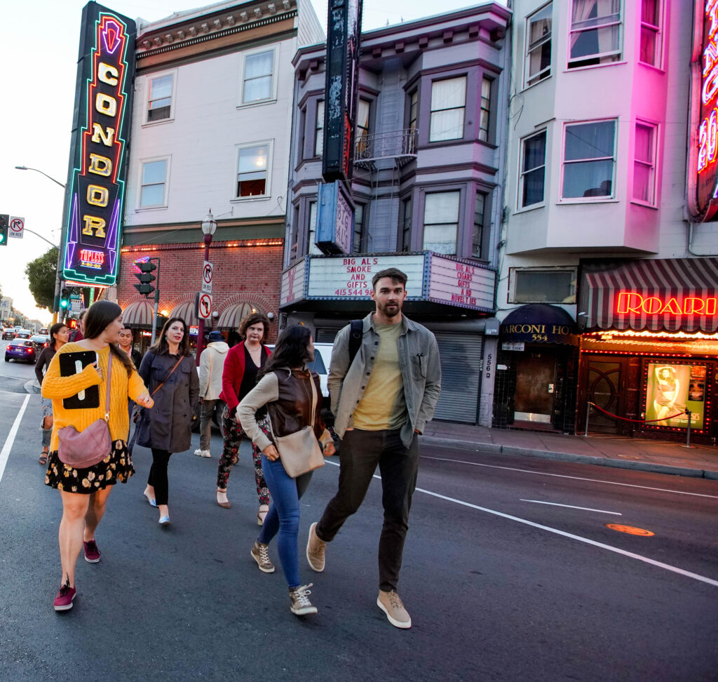 Group crossing road in North Beach on a San Francisco Food Tours for team building by Stretchy Pants Food Tours.